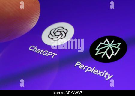 User finger interacting with ChatGPT and Perplexity icons on smartphone screen. Stafford, United Kingdom, June 23, 2025 Stock Photo