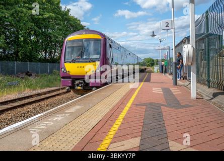 East Midlands railway regional type British Rail Class 170 Turbostar diesel multiple unit passenger train at Creswell railway station. Stock Photo