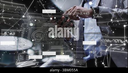 Tapping smartphone screen, man in business attire using holographic data at office desk, copy space Stock Photo