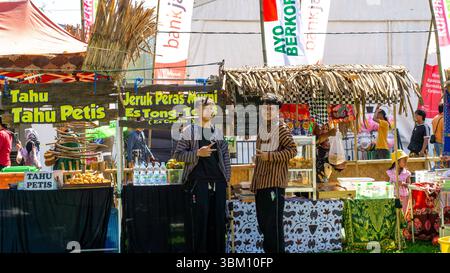 Traditional Indonesian food stalls during the Blitar Jadul bazaar. Jadul means old school. Stock Photo