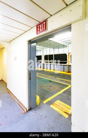 Exit sign and doorway on Washington state ferry, Washington State, USA. Stock Photo