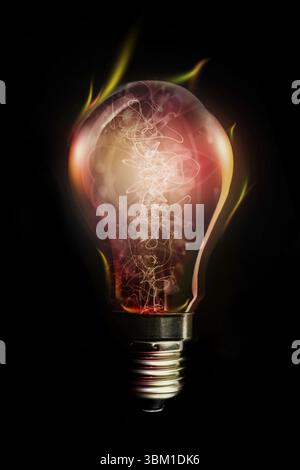 3D render glowing light bulb is floating in dark void with twisting filaments and flame wisps Stock Photo