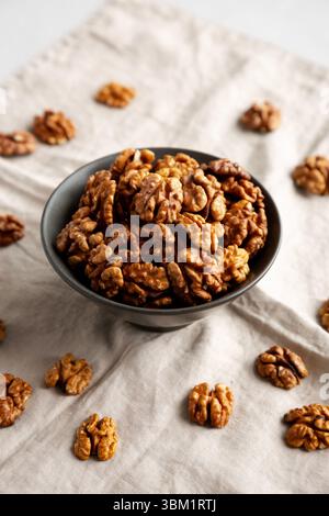 Raw Walnut Halfs in a Bowl, side view. Stock Photo