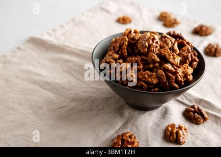 Raw Walnut Halfs in a Bowl, side view. Copy space. Stock Photo