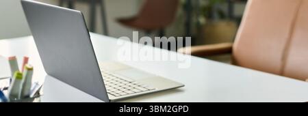 Modern Laptop on Desk Representing Neural Network Development Workspace Stock Photo