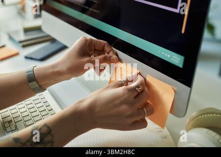 Young Adult Caucasian Woman Developing Neural Network and Organizing Notes Stock Photo