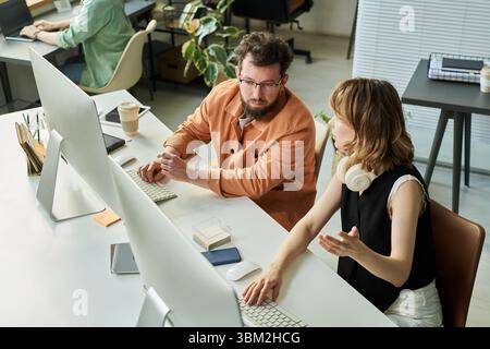 Team Collaborating on Neural Network Development Stock Photo
