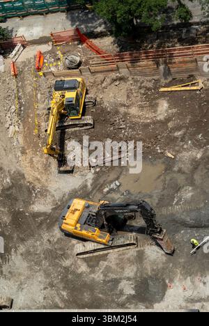 Workers performing excavation and preparation for foundation on E. 35th St. in the Murray Hill historic district, 2025, New York City, United States Stock Photo