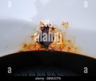 A Patch Of Rust Developing On The Wheel Arch Of A Car Stock Photo