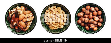 Assorted nuts in bowls. Healthy vegan snack. Objects isolated on white. Cutout bowls. Protein-rich natural food. Three various types of nuts. Stock Photo