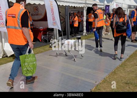 People photographing a Belvoir Rail robot dog, or Quadruped robot, survey tool, at Rail Live railway industry event, 18th June 2025 Stock Photo