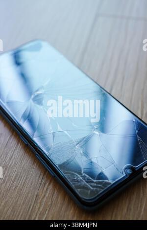 Close-up of broken cell phone screen, copy space Stock Photo