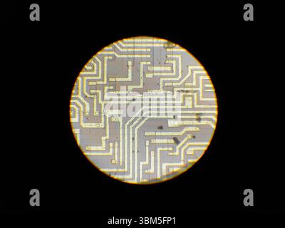 Microcircuit core, view from a microscope. Stock Photo