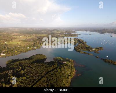 High angle aerial view over the estuary at Terras Bridge in Looe ...