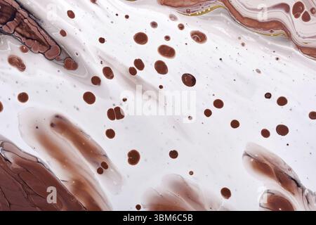 Acrylic Fluid Art. White waves and brown frothy bubbles. Digital decor. Abstract background or texture Stock Photo
