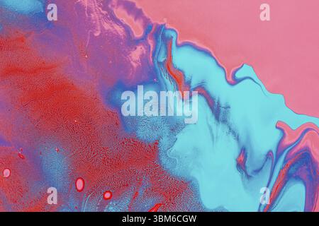 Acrylic Fluid Art. Glowing pink red waves and blue curls. Abstract neon background or texture Stock Photo