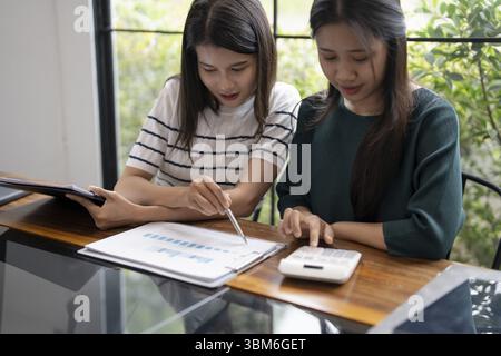 Asian Business woman Meeting Design Ideas professional investor working new start up project. businesswoman working together meeting concept Stock Photo