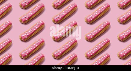 Seamless food creative texture or background. Eclairs pattern with pink icing and stars sprinkled on pink background Stock Photo
