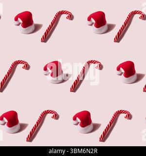 Trendy Christmas seamless texture with Santa Claus hat and candy cane. Modern christmas design Stock Photo