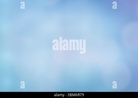 Abstract bokeh lights are glowing in soft diffused field, with pale blue and violet circles Stock Photo