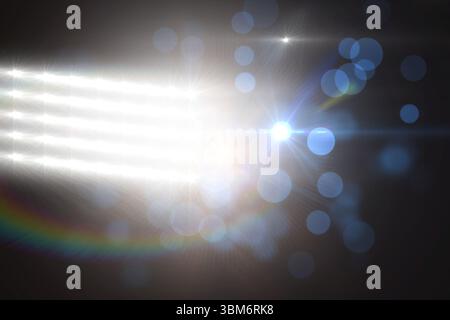 Vector illustration showing LED light array shining in dark studio, creating starburst lens flares Stock Photo