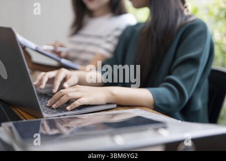 Asian Business woman Meeting Design Ideas professional investor working new start up project. businesswoman working together meeting concept Stock Photo