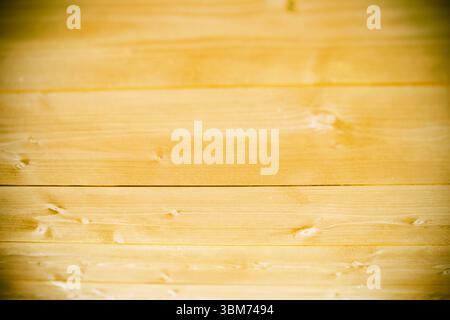 Wooden planks are creating uniform honey-colored flat design surface showing natural grain Stock Photo