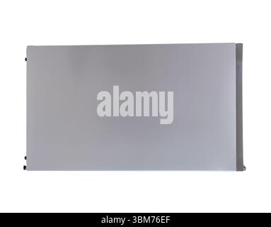 Silver refrigerator or fridge in horizon is isolated on white background with clipping path. Stock Photo