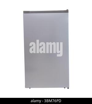 Single silver refrigerator or gray fridge in vertical is isolated on white background with clipping path. Stock Photo