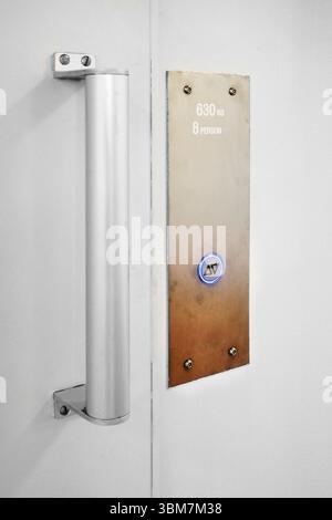 Elevator button on whte wall. Elevator Button up and down direction with copy space Stock Photo