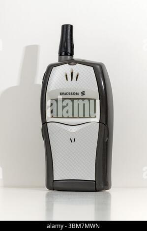 Milan, Lombardy, Italy- May 5, 2025 : Old SONY ERICSSON T20e cellphone isolated on white background representing obsolete technology and vintage commu Stock Photo