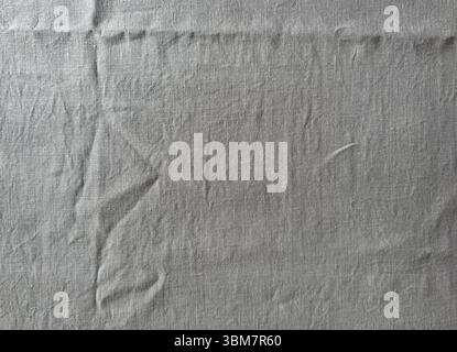 wrinkled grey linen tablecloth background Stock Photo