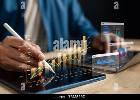 Financial chart and investment graph analysis stock on tablet screen Stock Photo