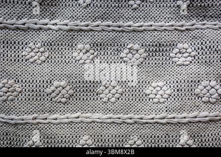 Knitted black and white abstract material texture Stock Photo