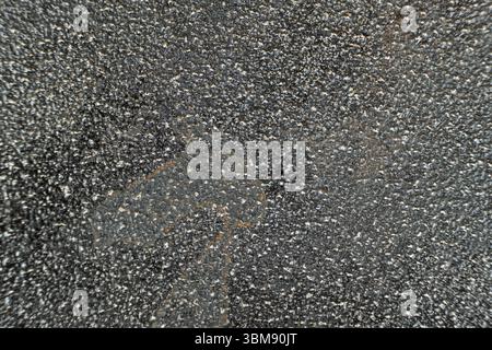 Rust stains on cast iron surface, macro. Stock Photo