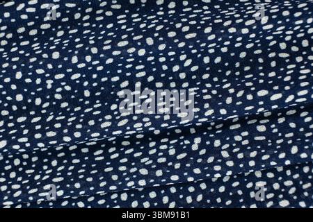 Macro Texture Polyester Blue Fabric Polka Dot Pattern. Stock Photo