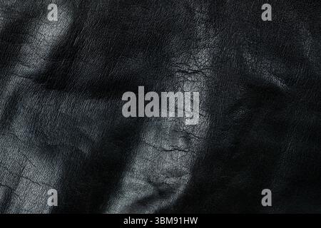 Close-Up of Dark Leather Surface for Design Use. Stock Photo