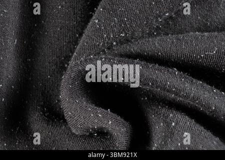 Close-Up of Old Cotton Polyester Elastane Fabric with Pilling Texture. Stock Photo