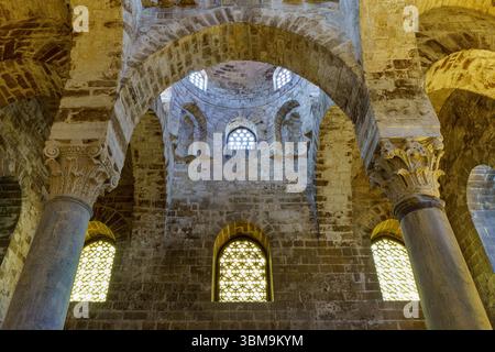 This image captures the serene and architecturally rich interior of the Church of San Cataldo in Palermo, Sicily. A masterpiece of Arab-Norman archite Stock Photo