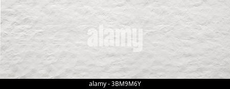 White textured wall providing a grunge background with copy space Stock Photo