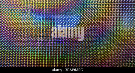 Holographic surface reflecting vibrant rainbow colors, creating an iridescent geometric pattern Stock Photo