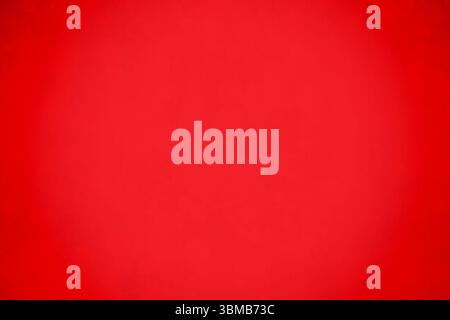 Flat design uniform red gradient surface is showing smooth radial color shift toward edges Stock Photo