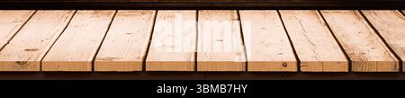 wooden tabletop detail is appearing in flat design, showing light planks and visible grain Stock Photo