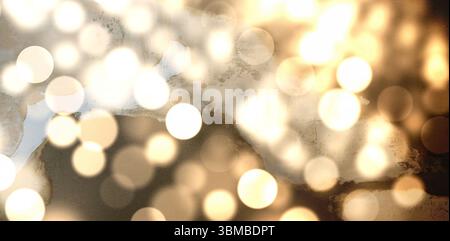 Abstract bokeh lights are being shown in flat style on textured backdrop, with warm golden circles Stock Photo