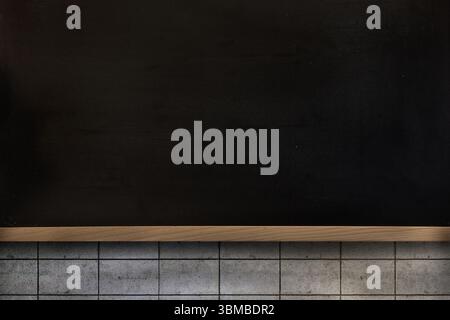 Blank chalkboard with wooden tray is being displayed on tiled classroom wall in flat design style Stock Photo