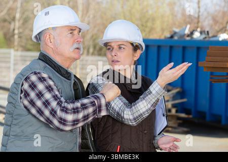 apprentice at work with senior engineer Stock Photo