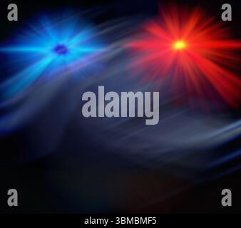 Two glowing starburst lights are emitting beams in dark abstract space, with swirling light trails Stock Photo