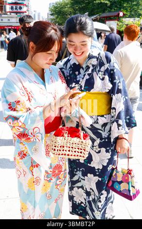 PEOPLE AT THE  TEMPLE SENSO-JI TOKYO Stock Photo