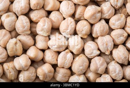 Top view of dried chickpeas. Raw chickpeas as  background.  Close-up Stock Photo