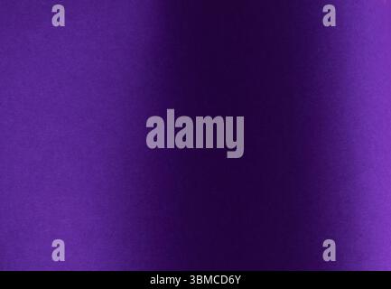 Monochrome designer paper in bright and dark violet purple tones with matte texture and elegant surface. Premium material in minimalistic style with s Stock Photo